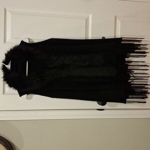 Black fur vest.